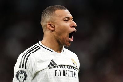 Kylian Mbappe nets late winner as Real Madrid beat nine-man Getafe to go top