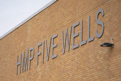 Prison officer and inmate appear in court over alleged sexual relationship