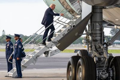 Trump forced to board Air Force One using small stairs after ‘hunting stand’ found with line of sight to plane