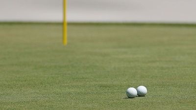 My Golf Ball Just Knocked Another Golf Ball Into The Hole. What Should I Do?