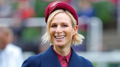 Zara Tindall just braved a cloudy day in burgundy and navy and her accessories are what took this look to another level