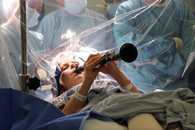Watch: Woman plays clarinet during four-hour brain surgery for Parkinson’s