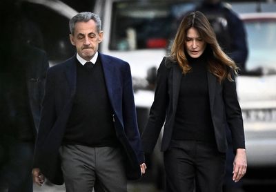 Ex-French president Nicolas Sarkozy arrives at prison to begin five-year sentence over Gaddafi money plan