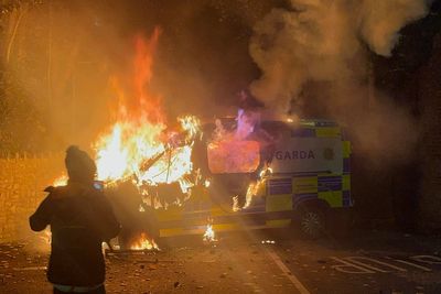Police attacked as violence erupts outside Dublin asylum seeker hotel