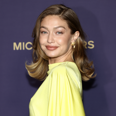 Gigi Hadid Styles a Butter Yellow Dress With Naked Shoes and a $1,395 Designer Bag