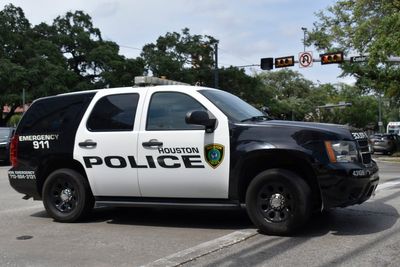 Two killed after fight spills into the road and they are hit by a passing motorist – who fled the scene