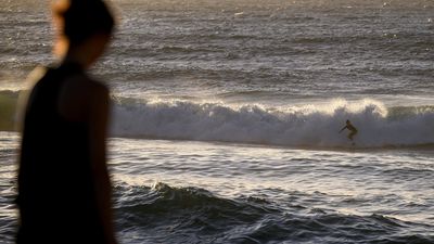 Warning after deaths of surfer and friend in wild winds