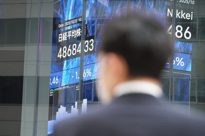 Asian shares retreat and crude prices soar $2 after Trump sanctions Russian oil giants