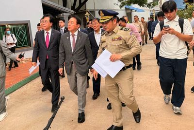 Cambodian police arrest 57 South Koreans over alleged links to online scams