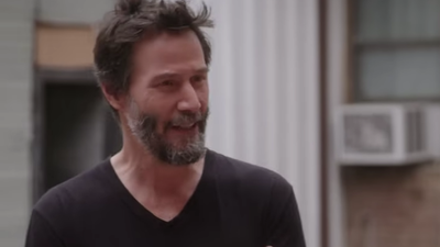 Keanu Reeves' Security Goes Full 'John Wick' As Obsessed Fan Tries To Climb Into SUV