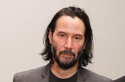 Keanu Reeves Fan Restrained by Security After Making Bizarre 'Divine Wife' Claim