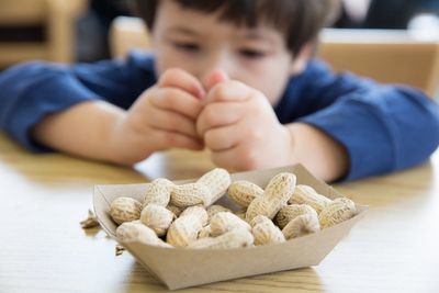 Thousands of children have avoided allergies by being given peanuts as babies