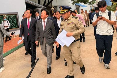 South Korean delegation of lawmakers visits Cambodian site of alleged online scam ring