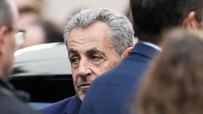 How were inmates able to film Nicolas Sarkozy's cell, given mobile phones are banned in prisons?