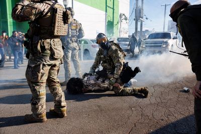 Two high school students detained and ‘assaulted’ by ICE agents when they joined a protest in Chicago, officials say