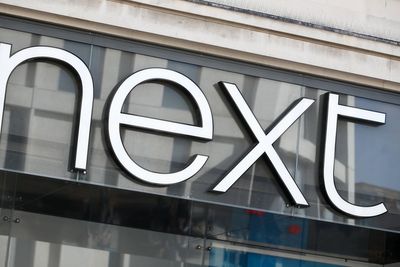 Next expected to reveal sales momentum despite consumer pressure