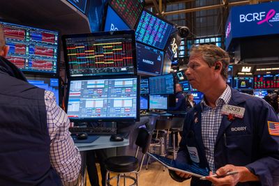 Dow futures jump 300 points as U.S.-China trade war heads for ceasefire while Wall Street eyes another Fed rate cut and earnings from AI giants