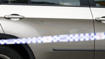 Car shot up outside long-targeted tobacco store