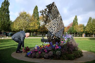 Charles lays flowers at first national LGBT armed forces memorial