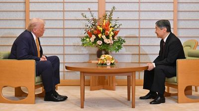 Japan's new PM looks to boost relations with the US as Trump touches down in Tokyo