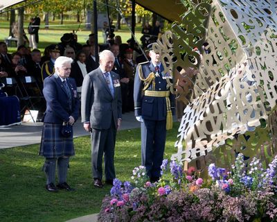 King Charles lays flowers at national memorial to LGBT armed forces veterans
