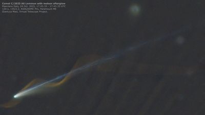 Glowing meteor trail photobombs Comet Lemmon in incredible telescope footage. 'A pure perspective miracle'