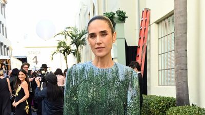 Jennifer Connelly's fringed party dress and short boots are the surprising combination that is perfect for the party season
