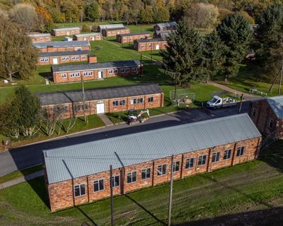 Plans to house UK asylum seekers in barracks are costly and complicated, experts say