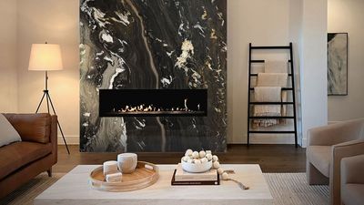 Surprise, This Super Unexpected Piece of Bathroom Furniture Is My Secret to Keeping Extra Blankets to Hand in My Living Room This Winter