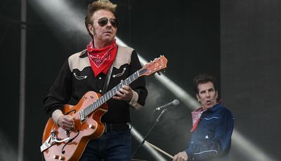“I’ve been trying everything I can to go on and do these shows, but it is just not possible”: Stray Cats cancel fall tour as Brian Setzer battles “serious illness”
