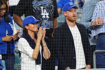 Harry and Meghan cheer on the Los Angeles Dodgers from front row seats