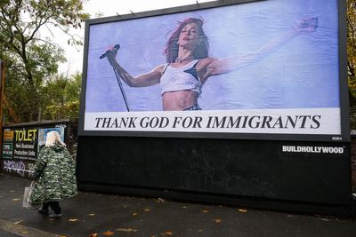 Dua Lipa appears on Thank God For Immigrants billboard in London