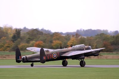 UK’s last flying Lancaster bomber touches down for maintenance work