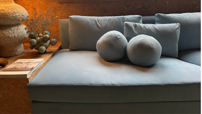 Bye-Bye Boring Throw Pillows – Meet the ‘Ball Pillow’ Trend Adding Sculptural Style To Sofas