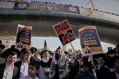 Water cannons fired as ultra-Orthodox Jews protest Israel military draft