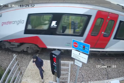 Teenager’s terrifying near-miss with oncoming train captured on video