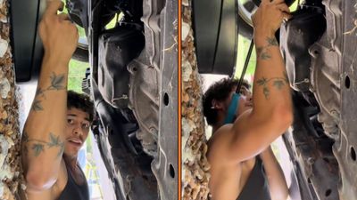 Man goes under his new Acura RSX for a simple oil change. Then something milky tan starts flowing out