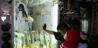‘Only death can protect us’: How the folk saint La Santa Muerte reflects violence in Mexico