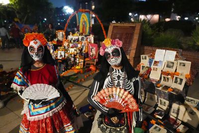 Mexican Americans balance tradition and modernity in Day of the Dead celebrations