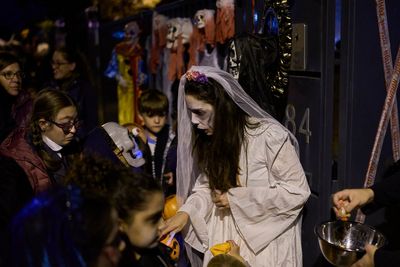 Halloween and a declining Christian tradition coexist on All Saints' Day in Spain