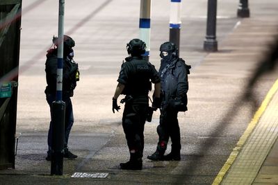 Nine suffer life-threatening injuries as terror police probe train stabbing