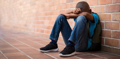 Boys, bullying and belonging: understanding violent initiation at a South African school