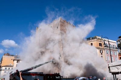 Watch: Moment medieval tower partially collapses in Rome as 'very complex' rescue underway