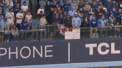 A Father and Son Amazingly Caught Both of the Dodgers' Heroic Game 7 Home Run Balls