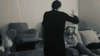 Meghan Markle Mocked for Filming Every Moment as Harry Looks Miserable