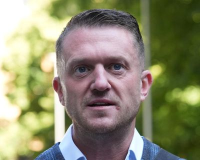 Tommy Robinson cleared of terror-related offence over phone code refusal
