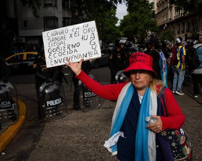 ‘We don’t have enough to eat, to live’: how Milei’s ‘chainsaw’ cuts are driving homelessness in Argentina