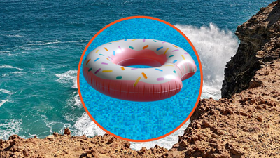 Crews raced to save a man lost at sea on a pool toy. Then a hand waved from the ocean