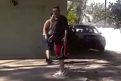 Father steps between cops and knife-wielding son to prevent him being shot after attack at home