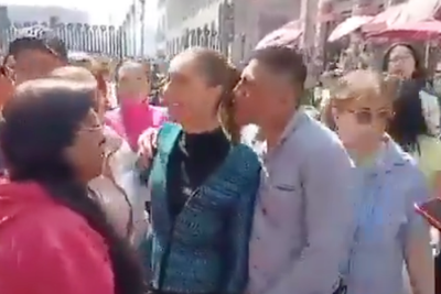 Where is her security? Man is able to grope and attempt to kiss Mexican president